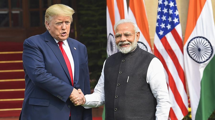 <div class="paragraphs"><p>Prime Minister Narendra Modi shakes hands with US President Donald Trump.</p></div>
