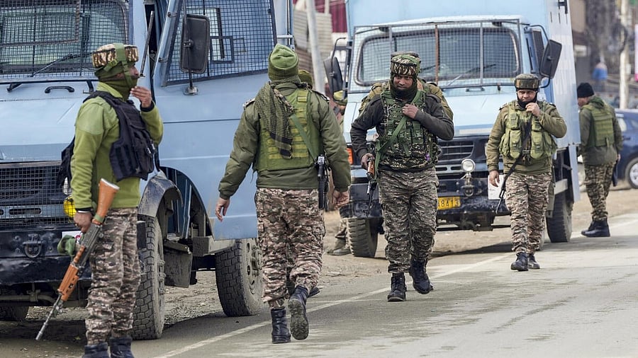 <div class="paragraphs"><p>Security personnel keep vigil as National Investigation Agency (NIA) conducts raid, on the outskirts of Srinagar, Monday, Feb. 2, 2026.</p></div>