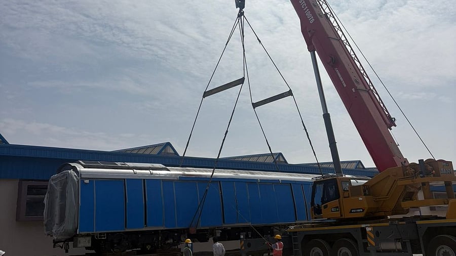 <div class="paragraphs"><p>A Pink Line coach is being unloaded at the Kothanur depot, Bannerghatta Road, on Tuesday. </p></div>
