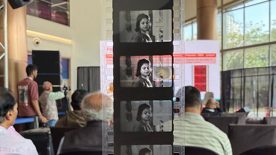 A 32 mm film of an unnamed movie was circulated among the audience at the session on ‘Archiving, Preservation and Restoration of Moving Images’ at Biffes on Tuesday. (Right) Film archivist Aparna Subramanian speaks at the session. 