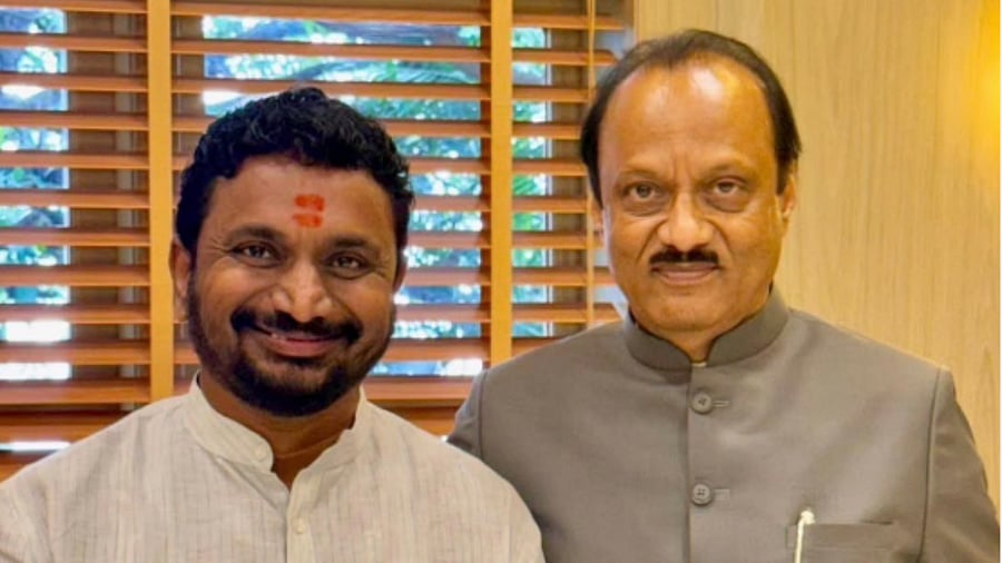 <div class="paragraphs"><p>Amol Mitkari with Ajit Pawar.</p></div>