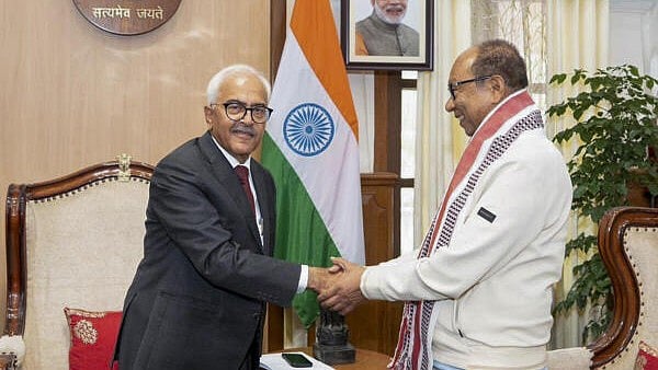 <div class="paragraphs"><p>Manipur Governor Ajay Bhalla, left, meets BJP Manipur leader Yumnam Khemchand Singh, who submitted the claim to form a BJP-led NDA government.</p></div>