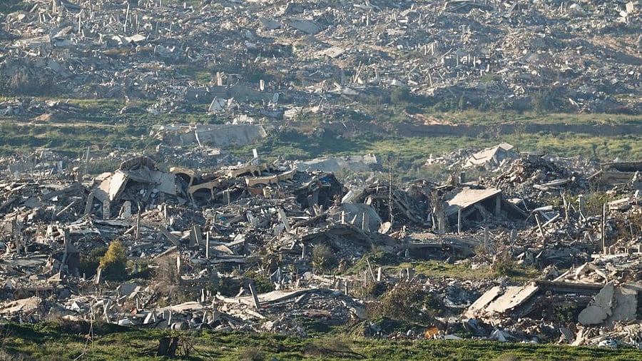 <div class="paragraphs"><p>Rubble from destroyed buildings lies in the north of Gaza, as seen from the Israeli side of the Israel-Gaza border in Israel.</p></div>