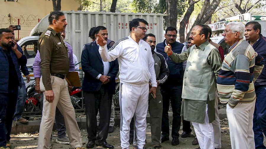 <div class="paragraphs"><p>Delhi minister Ashish Sood visits the spot following the death of a motorcyclist after falling into a pit dug for construction work by Delhi Jal Board, at Janakpuri, in New Delhi</p></div>