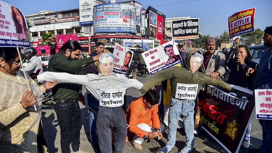 <div class="paragraphs"><p>People under the banner of 'Rashtriya Parshuram Sena' stage a protest against filmmaker Neeraj Pandey and actor Manoj Bajpayee over the title of their upcoming film <em>Ghooskhor Pandat</em>.</p></div>