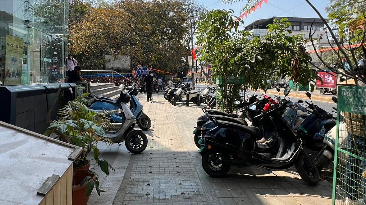 Indiranagar Residents Protest Ola Electric Store's Footpath Parking of New Vehicles