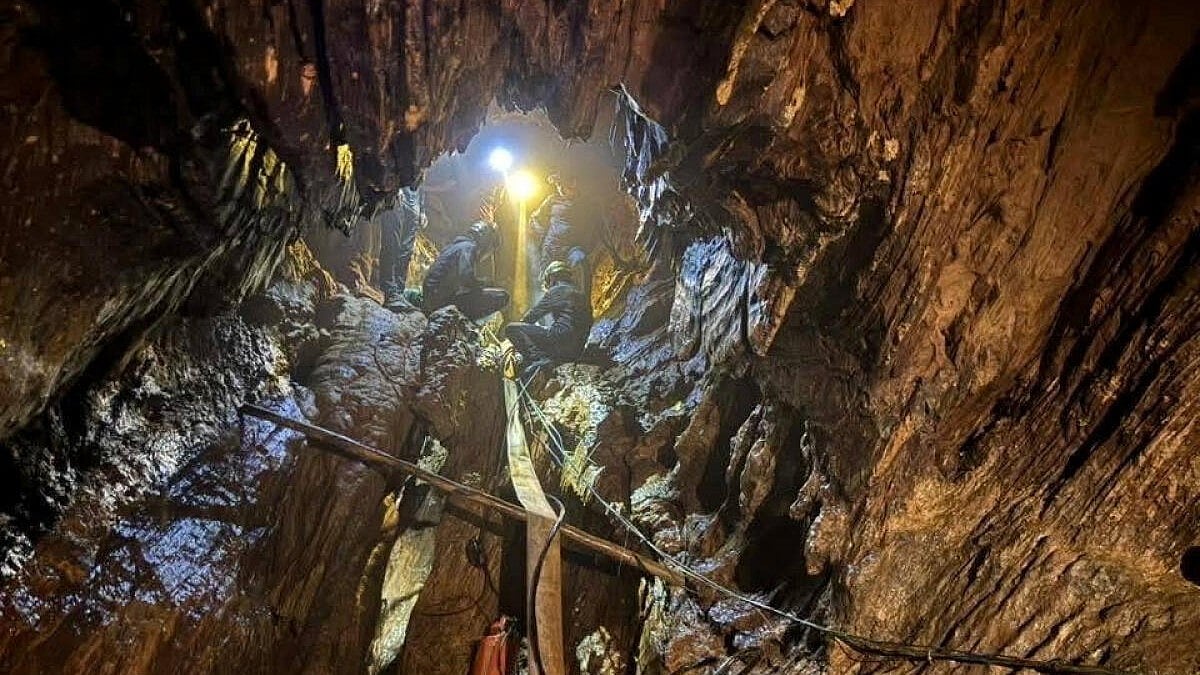 Rescuers pull four people from flooded cave in Laos, two still missing