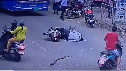 Watch: Man riding on two-wheeler collapses on road after tree branch ...