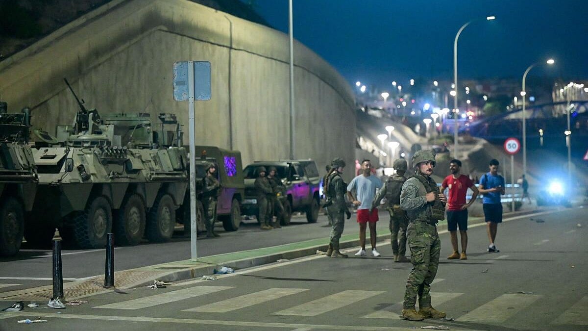 Migrant deaths rise to 18 in massive crossing into Spain's Ceuta from Morocco