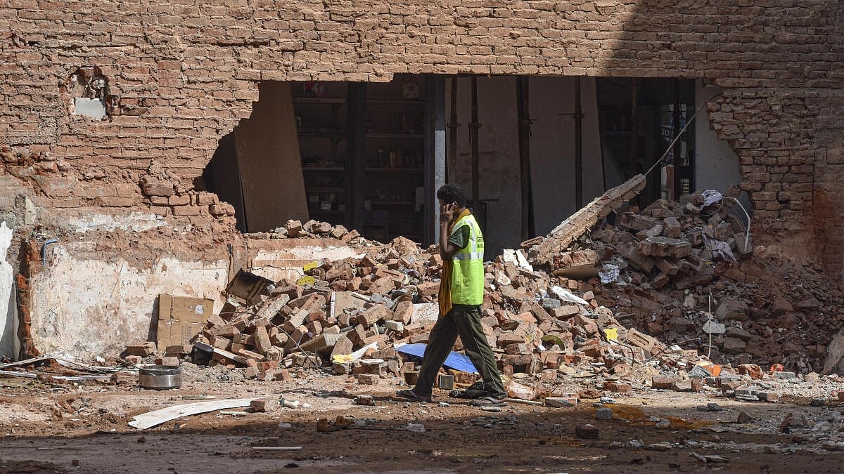 Delhi building collapse: Three truckloads of debris filled in basement before tragedy, say police