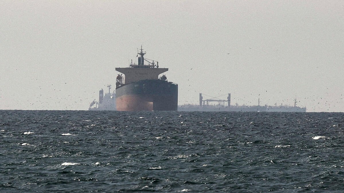 Cargo vessel hit by unknown projectile in Strait of Hormuz, two casualties reported, UKMTO says