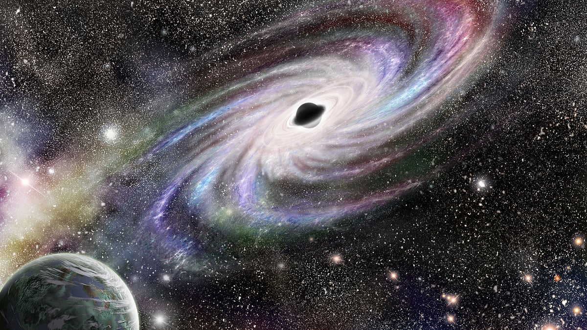 Study finds black holes shape galaxies far beyond their centres