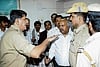 DySP Krishna Bhat reasoning with members of the Bangalore Advocates Association, following their protest against the police