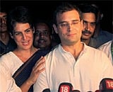 Cong leader Rahul Gandhi with his sister Priyanka addressing media , in Sultanpur. PTI