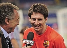Barcelona's Lionel Messi interviewed at a training session ahead of Wednesday's Champions League final match against Manchester United, AP