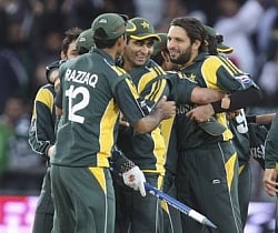 Pakistan celebrates after they defeated South Africa in their semi final. Shahid Afridi is to the far right.. AP