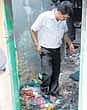 An official inspects the gutted house in Ramamurthy Nagar, Bangalore, on Tuesday. DH PHOTO