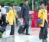 ALL WORK NOW:  Jet Airways staff report to work on Sunday after the airline pilots called off their five-day strike in Mumbai. PTI