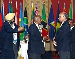 CWGF President Mike Fennel (R) talks to a delegate at the opening session of CWG Federation General Assembly meeting in New Delhi on Monday. PTI