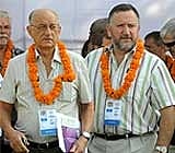 Commonwealth Games Federation Chief Michael Fennell (L) and CGF's CEO Mike Hooper (R) at the Commonwealth Games Village in New Delhi.
