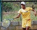 WELL BALANCED Nupur Umashankar returns to Maya Aryapalli in the girls under-12 pre-quarterfinal match. DH photo