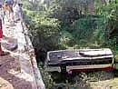 A view of KSRTC bus which fell into a 30-feet deep gorge near Kattehole in Tarikere.