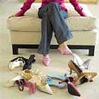 India's fielder Radha Yadav kisses the ball after taking a catch to dismiss New Zealand's Sophie Devine during the Twenty20 women's World Cup cricket match between New Zealand and India in Melbourne on February 27, 2020. (Photo by AFP)