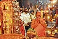 Tourism Minister Janardhana Reddy having darshan of Lord Sri Krishna at Sri Krishna Mutt in Udupi on Saturday. Putthige seer Sugunendra Theertha Swamiji, MLA Raghupathy Bhat are seen. DH Photo