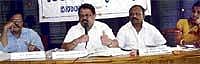 Taluk Panchayat President V B Udayshankar addressing members at the general body meeting. Executive Officer A Manjunath, ZP member Bajaji Chennaiah are seen. DH Photo