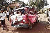 The mangled remains of the van. DH Photo