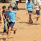 play things Children playing traditional games at the Tulu Sammelana in Ujire. DH photos