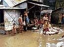 INUNDATED: Floodwaters surrounding houses in Dhaka, Bangladesh. File photo