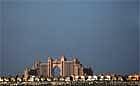 Atlantis hotel, built on the man-made Palm Jumeirah island off the Dubai coast, is seen behind a string of villas on Monday. Dubai's heavily-indebted group, Dubai World, began talks with its lenders over its request to restructure 22 billion dollars in debt but has made no specific proposals, a company spokesman said. AFP
