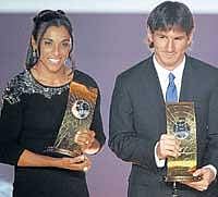 WORLDS BEST: Brazil's Marta and Argentina's Lionel Messi pose with their FIFA World Player of the Year trophies in Zurich on Monday. AFP