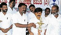 new light: State convener of Dalit Sangharsha Samiti Venkatagiriyayya inaugurating a convention organised to mark the death anniversary of B R Ambedkar in Kolar on Thursday. dh photo