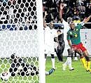 Cameroon skipper Samuel Eto'o (right) scores against Zambia during their African Nations Cup match on Sunday. AFP
