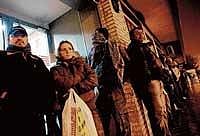 Job seekers lined up at an employment office in Madrid early one morning last month. NYT