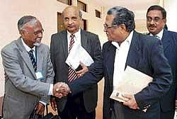 NLSIU Vice-Chancellor Dr Venkat Rao greeting former Chief Justice of India Justice Rajendra Babu at a function in  Bangalore on Monday. DH photo