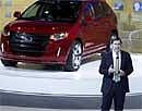 Jim Farley, Group Vice President of Global Marketing and Canada, Mexico and South America shows off the new Ford Edge at the 2010 Chicago Auto Show on Wednesday. AP