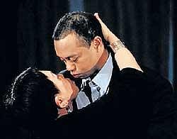 Tiger Woods hugs his mother Kultida following a statement in Ponte Vedra Beach, Florida on Friday. AFP