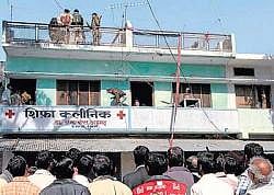 Police take positions to capture Shameem Ahmad at Bakshi-ka-Talab in Lucknow on Friday. PTI