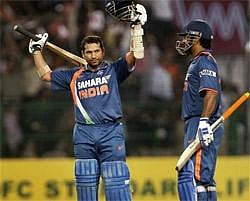 Indian batsman Sachin Tendulkar acknowledges the crowd after reaching his double century during the second one day cricket match between India and South Africa, in Gwalior, Wednesday. AP