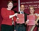 From left, Helen Clark, UNDP Administrator, Ajay Chhibber, UN Assistant Secretary General & UNDP Assistant Administrator and Syeda Hameed ,member of Planning Commission, Govt of India in New Delhi.  UNDP Report