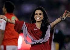Kings XI Punjab co-owner Priety Zinta gestures towards her fans before the start of the IPL T20 match against Delhi Daredevils at Mohali on Saturday. PTI