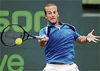 On target: Belgiums Olivier Rochus en route to his win over Serbias Novak Djokovic on Saturday. AFP