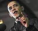 US President Barack Obama rallies troops at Bagram Air Base in Afghanistan on Sunday. AP