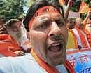 Activists of Indraprastha Vishwa Hindu Parishad shouting slogan during a protest against the statement regarding alleged live-in relationship between Lord Krishna and Radha made by a Supreme Court Bench while dealing with a case, at Jantar Mantar in New Delhi on Monday. PTI