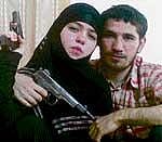 An undated and unlocated photo shows 17-year-old suicide bomber Dzhennet Abdurakhmanova posing with her husband Umalat Magomedov who was killed in 2009. AFP/NEWSTEAM
