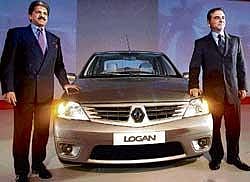 File picture of Renault & Nissan CEO Carlos Ghosn (right) and M&M  MD Anand Mahindra with the Logan car. AFP