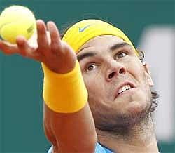 Spain's Rafael Nadal serves the ball to Spain's Juan Carlos Ferrero, during their quarterfinal match of the Monte Carlo Tennis Masters tournament, in Monaco, Friday. AP